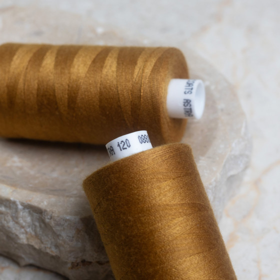 Ochre overlock bobbin x 4