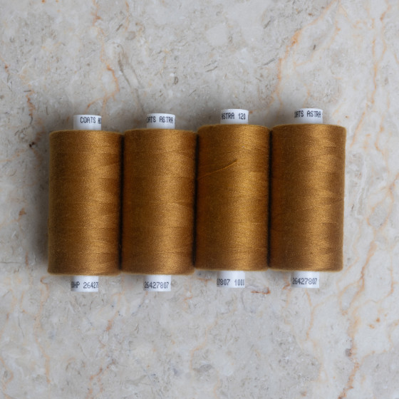 Ochre overlock bobbin x 4